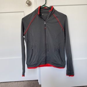 Grey dri fit zip up with orange detail